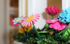 fake flowers on window ledge